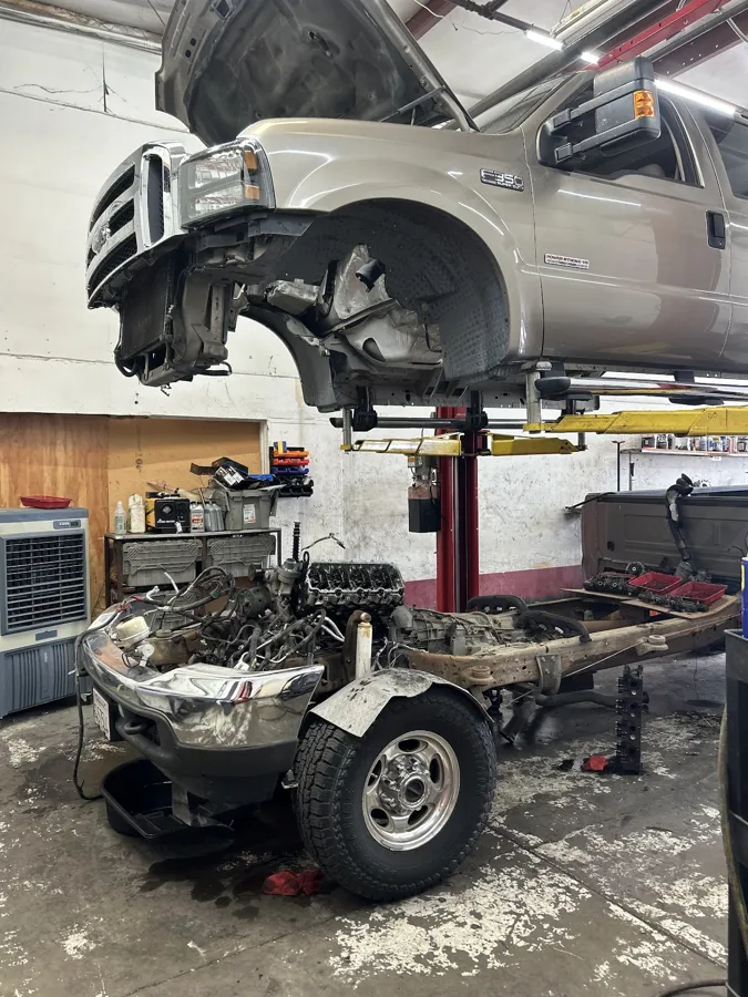 Ford Super Duty with the cab off the frame for engine work at Too-Big Performance in Rocklin, CA