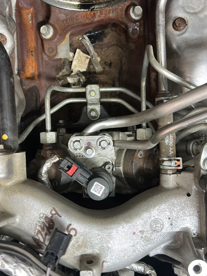 High-pressure fuel pump swap in progress on a Ford diesel at Too-Big Performance in Rocklin, CA