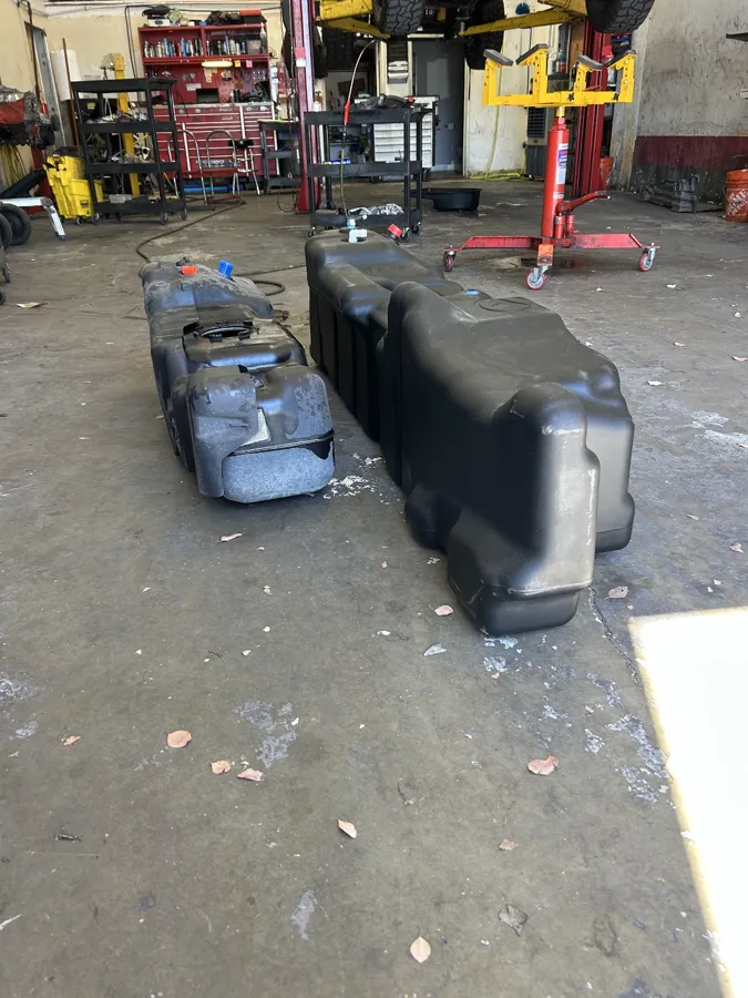 Fuel tanks pulled and staged on the shop floor at Too-Big Performance in Rocklin, CA